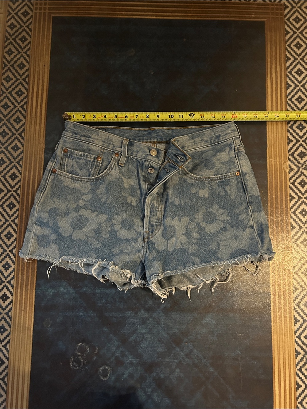 Levi's Faded Blue Floral-Effect Cutoff Jean Shorts